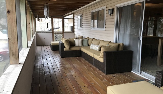 House overlooks Lake Sequoyah with public access to the lake and close to Beach