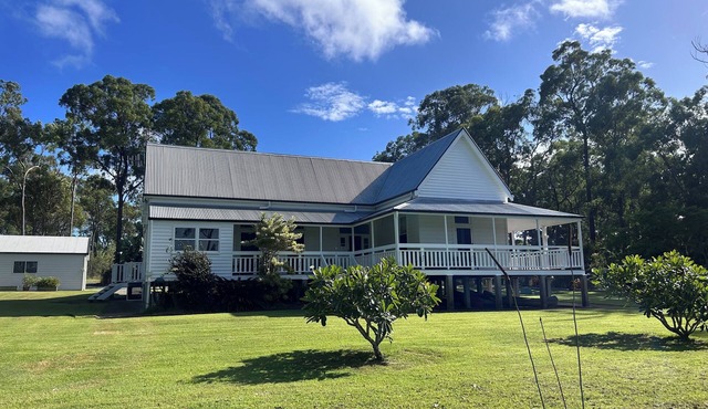 House Overlooking a Private 12 Acre Lake And Only 4 Minutes To The Beach