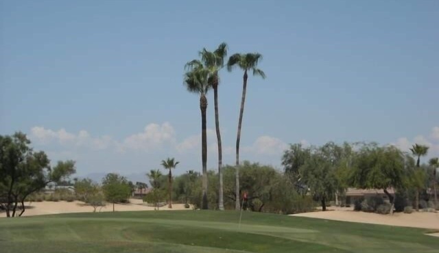 House Right on the 12th Green at Desert Springs Golf Course with Amenities