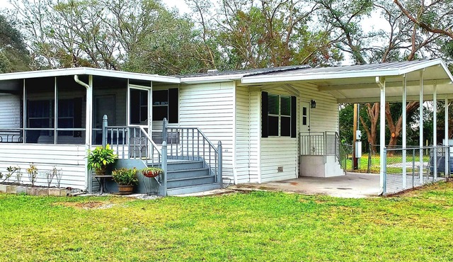 House with 3-bedroom 2 Bath on one acre of land in wonderful Wesley Chapel