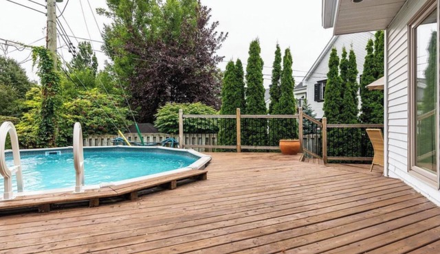 House with 3 floors and pool. Very cozy and chalet like. Near golf course.