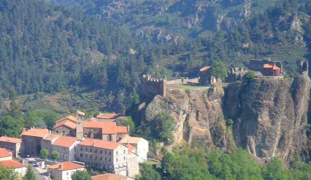 House with apparent rock