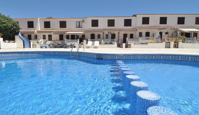 House with community pool and car parking
