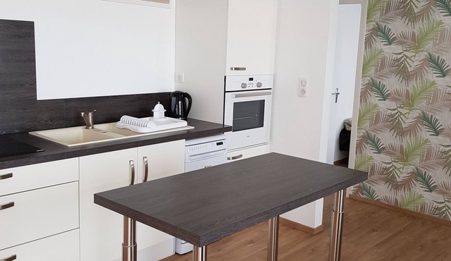 House with enclosed garden, on the sea side