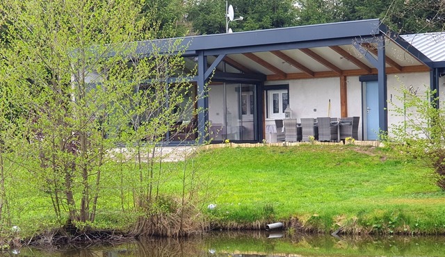 house with fishing pond