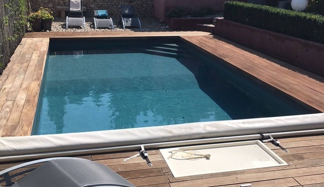 House with swimming pool and large garden in the heart of the village