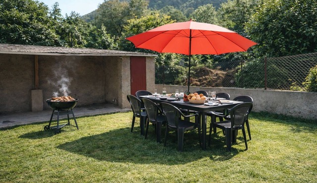 House with garden and barbecue convivial moments with family and friends