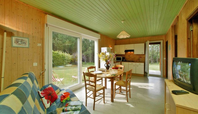 House with garden in the middle of nature