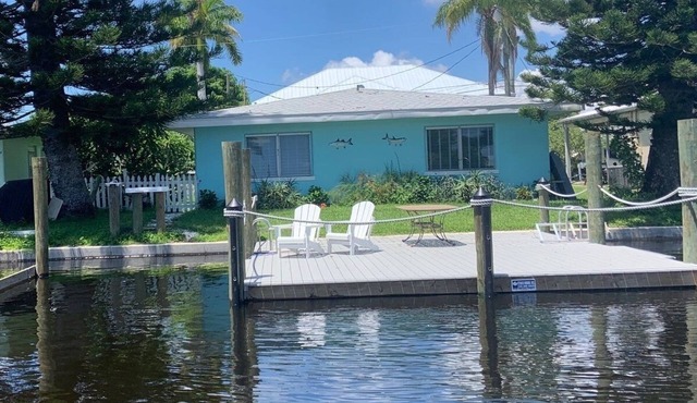 House with large overwater deck on Gulf canal in Matlacha