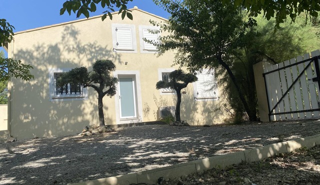 House with large wooded grounds