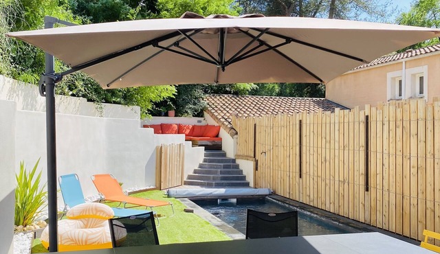 House with pool between river and sea