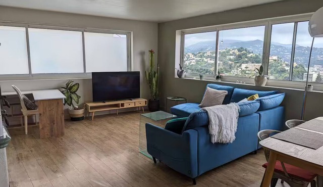 House with panoramic city and mountain views