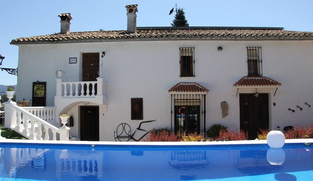 House with pool, garden, incredible views and well located.