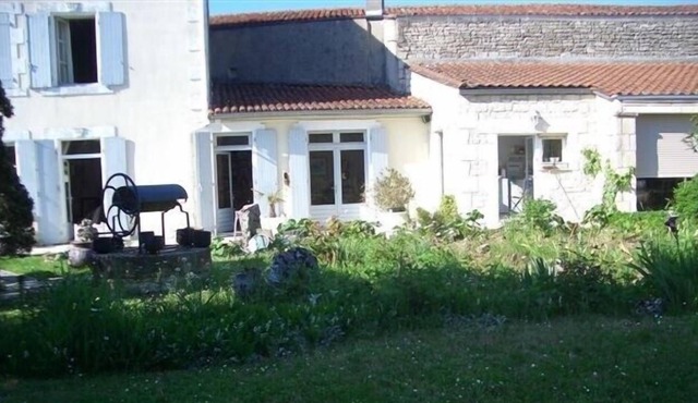 House with pool in the heart of a village