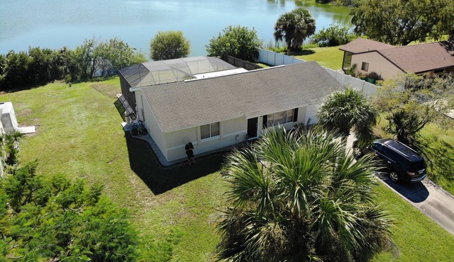 House with solar heated pool and lake view!