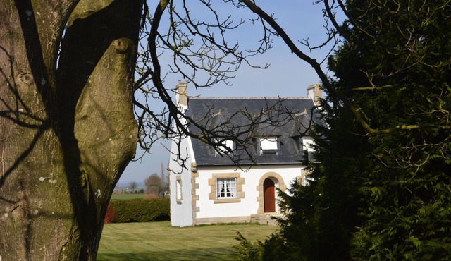 House with spacious garden and open views over the countryside.