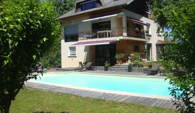 House with swimming pool by the river