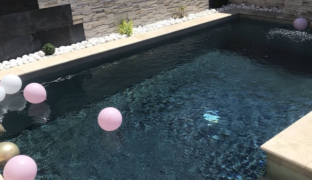 House with swimming pool facing south close to all shops