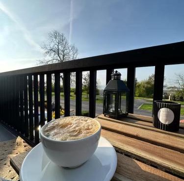 Huge Beach house -Seaview balcony-perfect location Pass the Keys