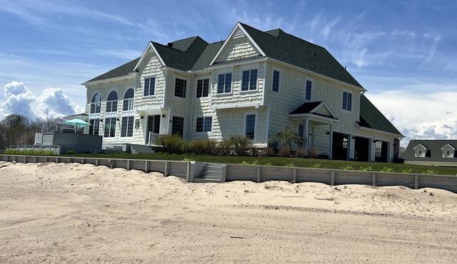Huge Cape Cod Style Home on all Sandy beach/Cedar Lake MI