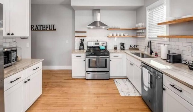 HUGE NEW CONDO IN THE HEART OF ITALIAN VILLAGE
