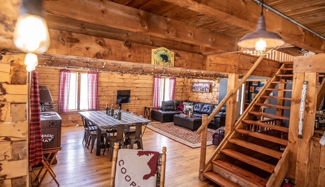 Huge yet cozy log cabin, nestled conveniently off the beaten path. Peaceful!