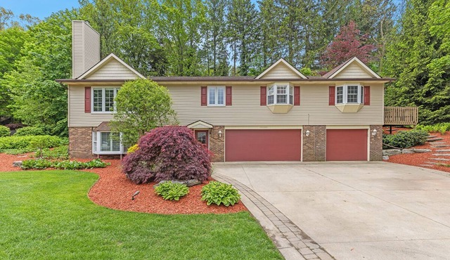 Ideal Lakeshore location in serene wooded landscape with waterfalls.