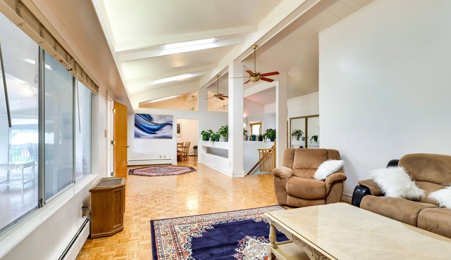 Ideally located home overlooking mountain & golf views - two primary bedrooms