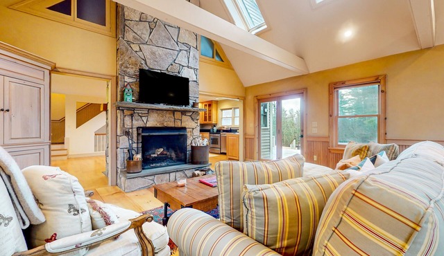 Ideally located spacious home with pool table, large deck, five fireplaces, W/D