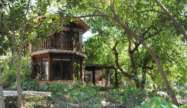 Idyllic cottage in the middle of nature close to river