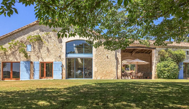 Idyllic country house with pool in a beautiful landscape.