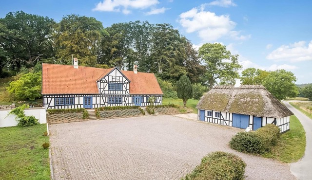Idyllic country house with own forest in fantastic nature.