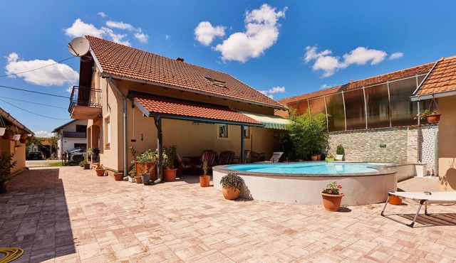 Idyllic, family-friendly vacation home with private outdoor pool and lush garden.