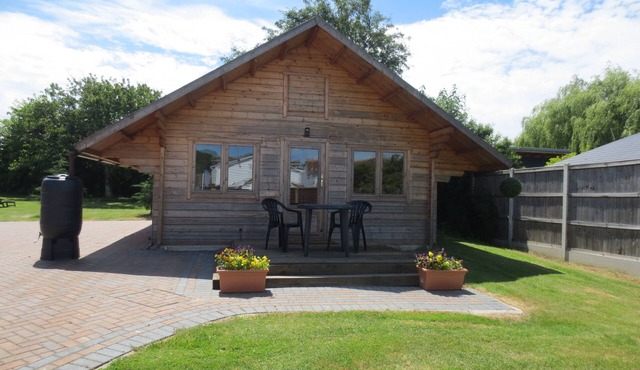 Idyllic Log Cabin in the garden of England