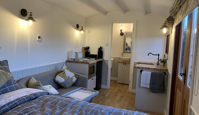 Idyllic rural Shepherds Hut in private wildflower meadow.