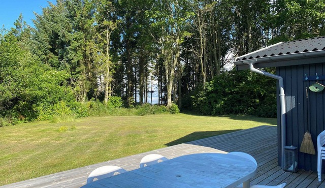Idyllic summer house at the waters edge