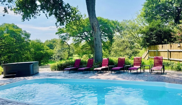 Idyllic waterfront getaway with private hot tub & deck views - near golf