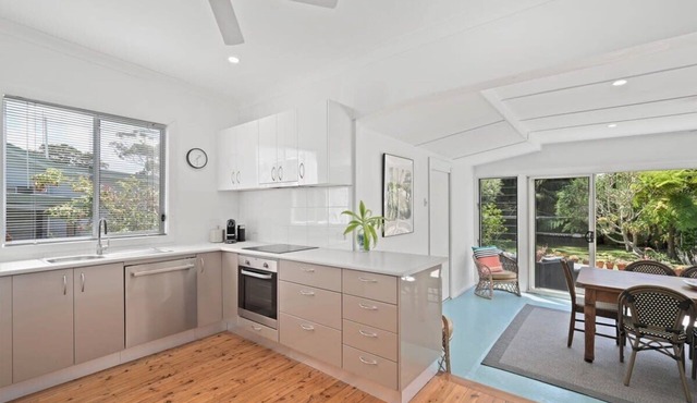 Immaculate Beachside Home with Fireplace and Patio