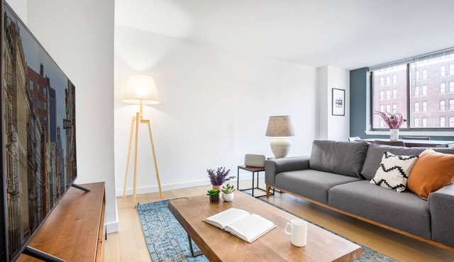 Immaculate Chelsea 1BR w/Water views + Doorman by Blueground