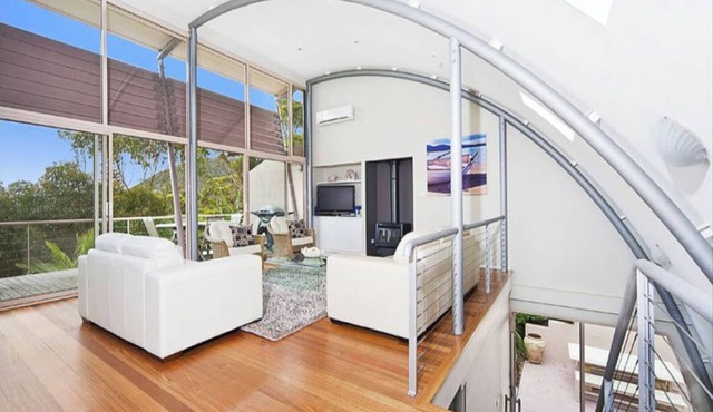 Immaculate designer house-sweeping views over iconic Blueys Beach 3min walk away