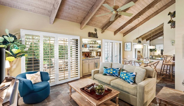 Immaculate Mission Hills tennis villa with mountain views from private roof deck