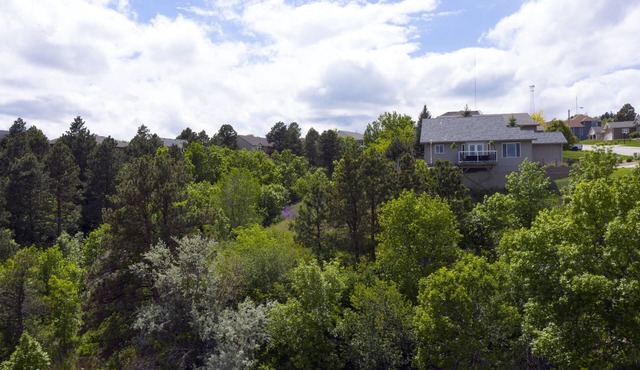 Immaculate modern home with stunning views nestled into a beautiful valley.
