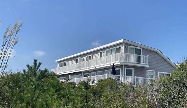 Immaculately Renovated Beachfront Townhome with Incredible Views!