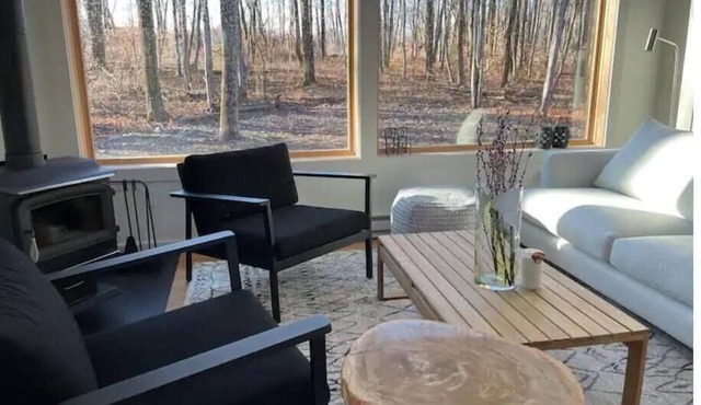 Immerse in your private woods in our modern cabin