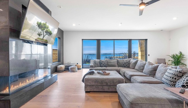 Impressive home w/water view, 2 large decks, 2 living rooms & 2 master ensuites