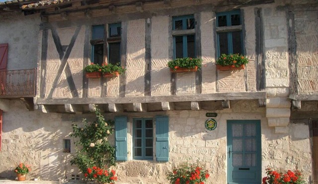 In a listed village, half-timbered house overlooking a wooded valley