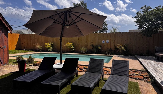 In-ground pool, hot tub, fire pit, massage room!