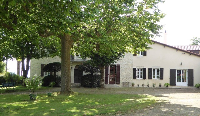 In One Wing of a Former Manor House