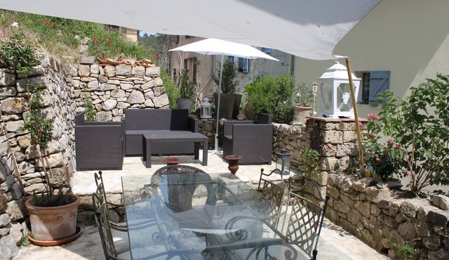 In the center of the historic village, charming house full of character