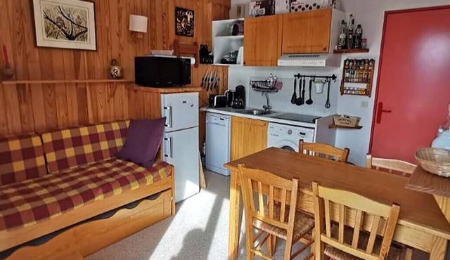 In the center of the resort, close to the shops and back to the forest